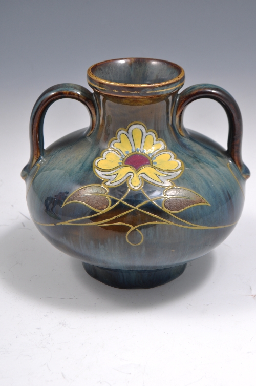 Royal Doulton stoneware,  two handled vase of compressed form, stylised floral decoration on a