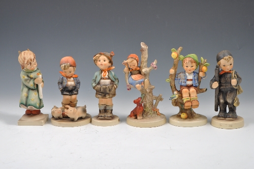 A large Hummel figure, "Apple Tree Boy", 16cm and five others, "Chimney Sweep", "Angel", "Girl in