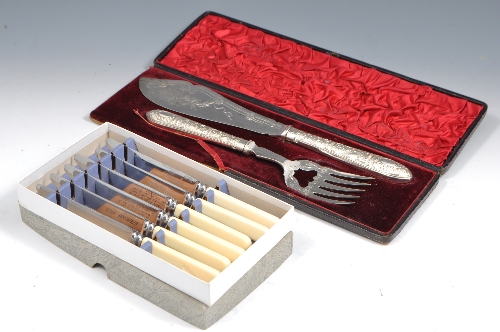 Pair of Victorian electroplated fish servers, engraved blades, cast and filled handles, boxed and