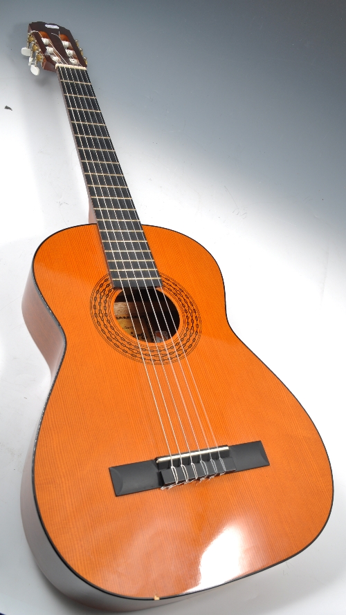 Spanish six-string acoustic guitar, labelled - Admira, in a soft case.