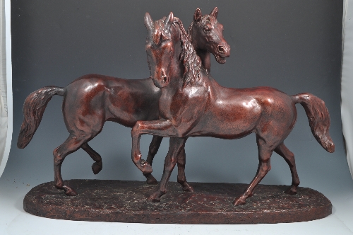 Austin Sculpture bronzed composition group of two horses, after Le Clerc, 65cms.