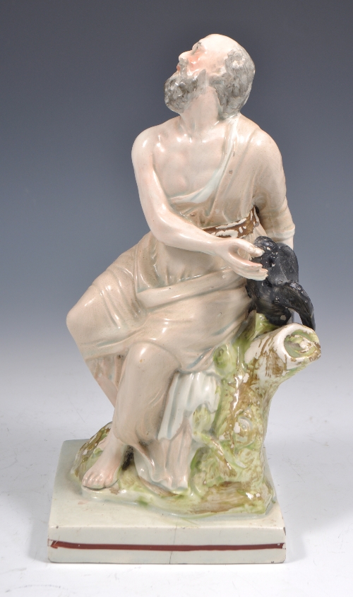 Staffordshire pearlware figure - Elijah with a Raven", early 19th Century, painted in colours,