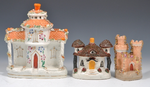 Staffordshire cottage, designed as a house with a verandah, encrusted and painted decoration, 23cms,