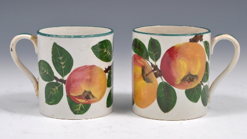 Wemyss pottery mug, painted with fruit, impressed mark and retailed by P.G. Goode & Co., 9cms and