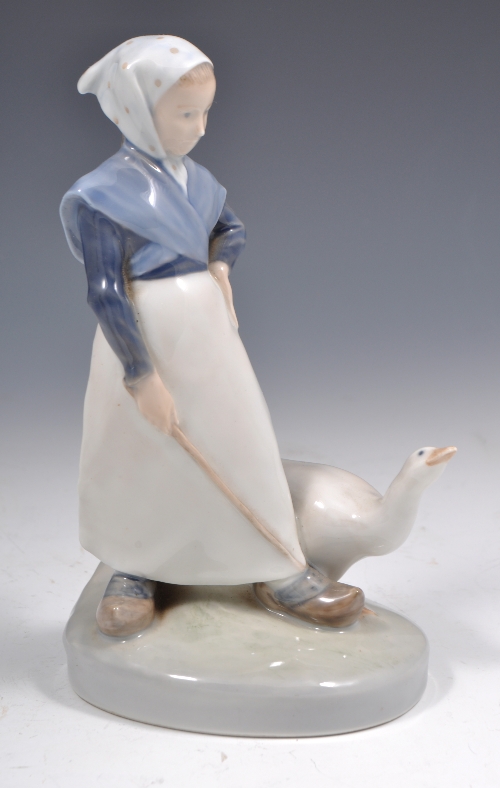 Royal Copenhagen figure of a goose girl, No. 528, 28cms.