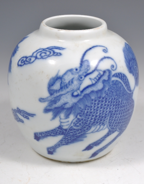 Chinese blue and white ginger jar, decorated with  ferocious temple lions, bears four-character