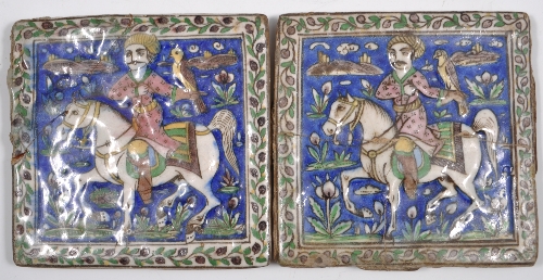 Pair of Persian tiles, probably 19th Century, each moulded and painted with an equestrian figure