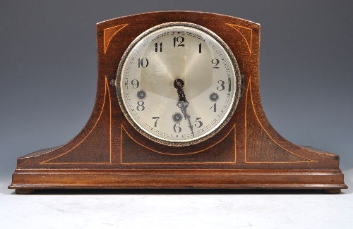 Inlaid mahogany mantel clock, silvered dial, the movement striking on five gongs, width 45cms.