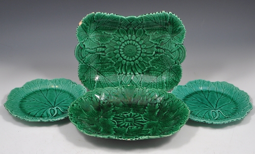 Wedgwood green-glazed earthenware dessert dish, leaf and sunflower moulded, width 28cms, another