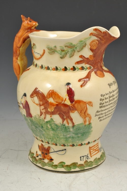 Crown Devon musical jug, "John Peel", 21cms and a late Staffordshire group, "The Drunkard", (2).