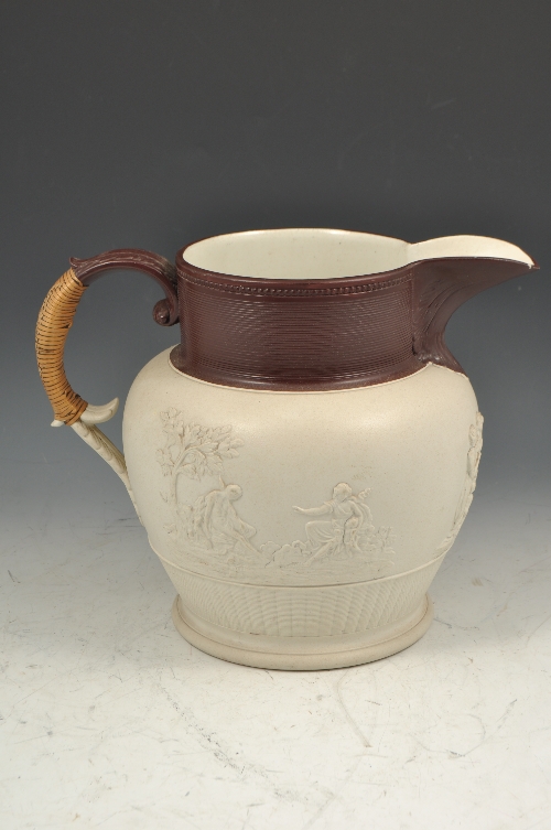 Castleford type salt-glazed stoneware jug, mid 19th Century, moulded decoration, cane bound