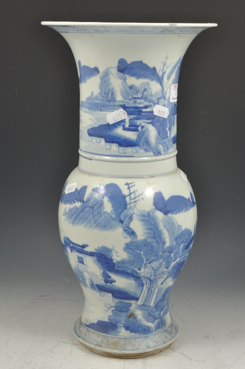 Chinese blue and white rouleau vase, painted with landscape scenes, 39cms.