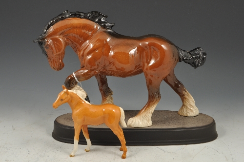 Beswick model of a chestnut coloured cart horse, on an oval stand, 24cms and a Beswick model of a