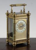 A late 19th century French gilt brass carriage timepiece, with enamelled arabic chapter ring, 5.