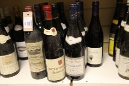 A thirteen bottle red Bordeaux, Rhone, and Loire assortment including one Chateau Grand Puy