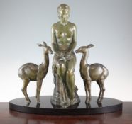 Ugo Cipriani. An Art Deco bronze group of a seated maiden and two fawns, on signed black marble