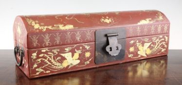 A Chinese gilt decorated red lacquered dome top scroll box, the exterior decorated with shou