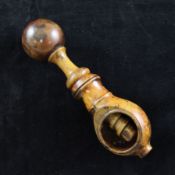 A continental burr wood nutcracker, with single screw thread, 6in.