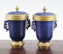 A pair of Samson powder blue and gilt bronze mounted jars and covers, c.1900, the U shaped bodies