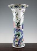 A large Chinese famille rose sleeve vase, 19th century, painted with birds amid magnolia and other