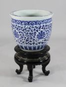 A large Chinese blue and white jardiniere, painted with lotus flowers and scrolling leaves, ruyi