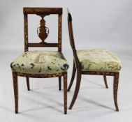 A pair of early 19th century Dutch floral marquetry side chairs, with vase carved splat backs, the
