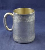 A Victorian silver mug, of restrained tapering form, engraved with foliate bands, A.B. Savory &