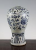 A Chinese Ming Dynasty blue and white meiping vase, early 16th century, painted with lotus flowers