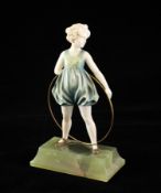 Ferdinand Preiss (1882-1943). An Art Deco ivory and cold painted bronze figure `Hoop Girl`, on a