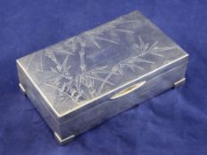 A 20th century Chinese silver rectangular cigarette box, with engraved inscription and lid decorated