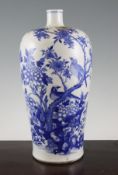 A Chinese blue and white meiping vase, early 20th century, painted with birds amid flowering