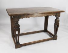 A late 17th century North Italian Tuscan oak side table, with pierced tapering profile legs united
