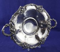 A Victorian silver two handled fruit bowl, of circular form, with pierced foliate scroll border,