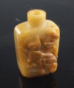 A Chinese creamy quartz cameo snuff bottle, late 19th / early 20th century, one side carved in