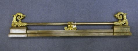 A 19th century continental brass and steel fender, with acanthus scroll mounts, 3ft 10.5in.