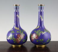 A pair of Chinese cloisonne enamel bottle vases, early 20th century, each decorated with