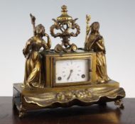 A late 19th century ormolu desk stand timepiece, with rectangular white enamelled dial and two train