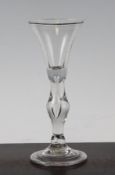 A balustroid gin glass, c.1740, the bell shaped bowl above a swelling tear-drop knopped stem with