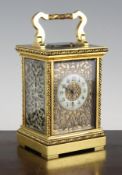 An early 20th century French gilt brass hour repeating carriage clock, with enamelled arabic chapter