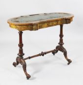 A Victorian walnut and marquetry writing table, with serpentine oval top and frieze drawer, on