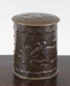 A Newlyn Arts & Crafts copper circular tea caddy, the lid embossed tea, body embossed with