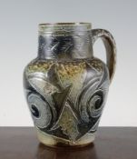 A Martin Brothers baluster stoneware jug, incised with stylised leaves, signed `R. W. Martin,