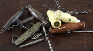 A group of assorted corkscrews, including two with bone handles and travelling corkscrews