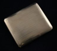 An engine turned 9ct gold cigarette case, gross 113 grams, 3.75in.