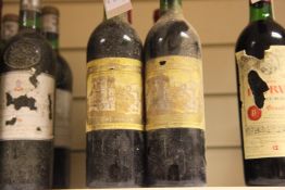 Five bottles of Chateau Ducru-Beaucaillou 1976, St Julien. Five into neck, one very top shoulder;