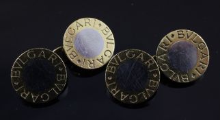 A pair of Italian 18ct two colour gold Bulgari cufflinks, of disc form, each inscribed Bulgari