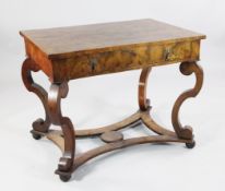 A late 17th century Low Countries walnut writing table, with a geometrically veneered top and frieze