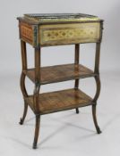 A French mahogany, marquetry and kingwood banded three tier jardiniere, in transitional style,