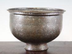 An Islamic tinned copper safavid bowl, with circular foot rim, decorated all over with floral