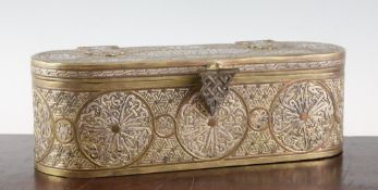 An Islamic silver and copper inlaid brass Cairo ware writing box, the hinged lid revealing a